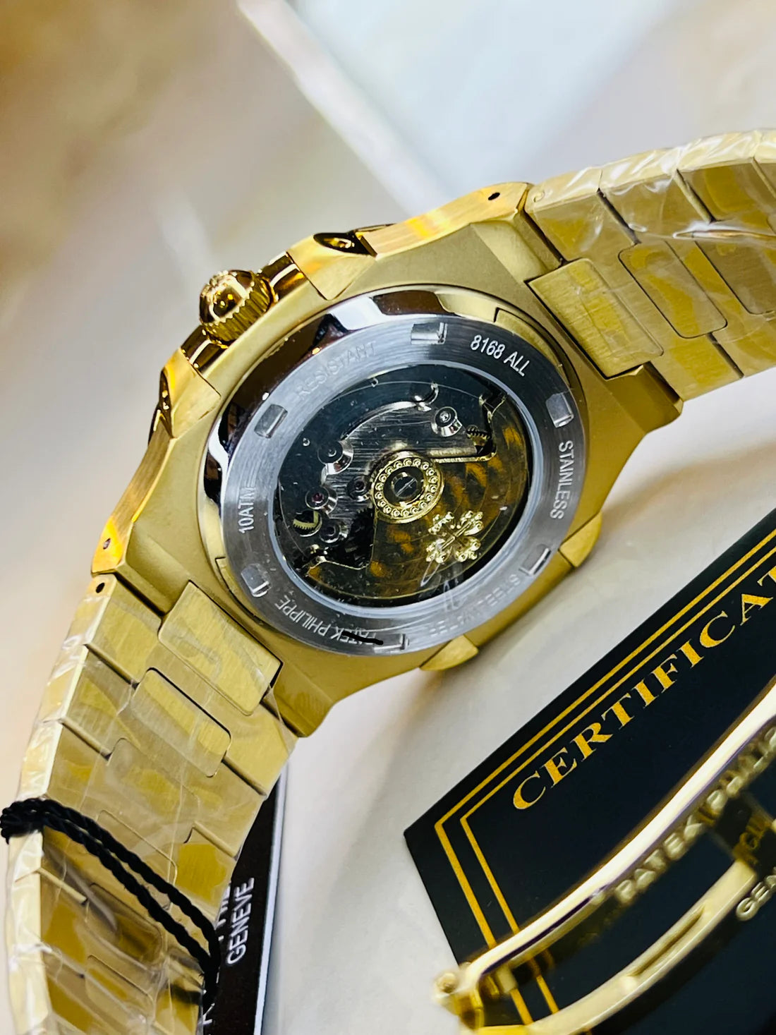 Gold Sapphire Blue Automatic Nautilus Watch